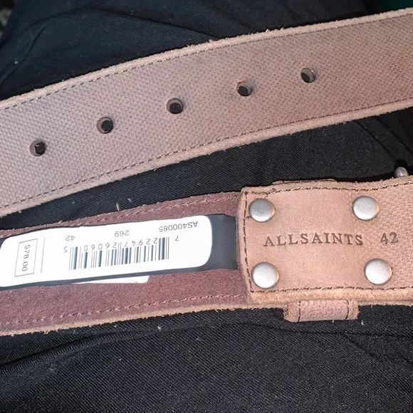 Allsaints textured leather 1 1/2”W US 42knurled roller buckle an embossed logo